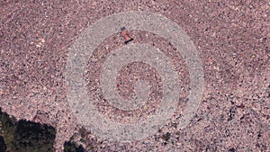 Bird`s eye view of a garbage dump where machinery equals mountains of household waste, Ukraine. Ecological problem