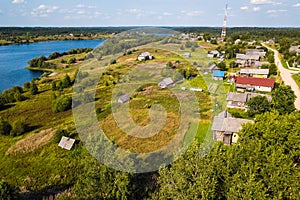 Bird`s eye view of Ladva village, green fields and Vepsian forest, the border Leningrad oblast