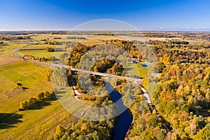 A bird\'s-eye view of the river road and young fresh fields