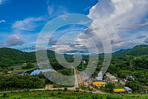 Bird`s eye view, see the reservoir And small power plant In the middle of the mountainl