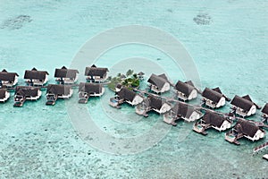 Bird's-eye view of water bungalows in maldives