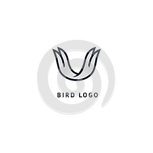 Bird silhouette logo. Vector abstract minimalistic illustration flying fowl. Pigeon icon. Zoo, pet shop, farm, bird feather, wild photo