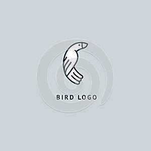 Bird silhouette logo. Vector abstract minimalistic illustration flying fowl. Pigeon icon. Zoo, pet shop, farm, bird feather, wild photo