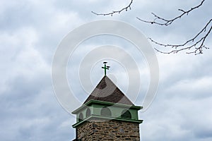 A Bird on Top of a Church Tower