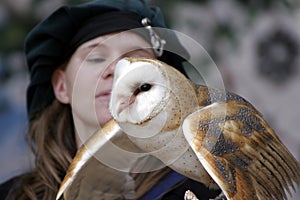 Bird trainer holding an Eastern Screech Owl