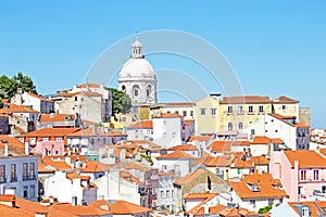 Bird view of central Lisbon with colorful houses and orange roof