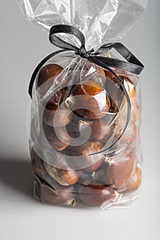 Bird view on luxury plastic bag of sweet chestnuts