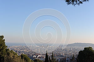 Bird view panorama of cityscape of Barcelona, capital of Catalonia, Spain from Park Guell before sunset with blue sky