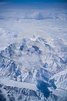 Bird view of Snowy Tianshan from an airplane photo