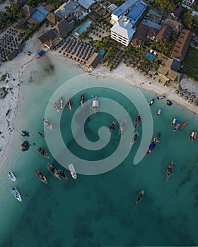 Bird view of wooden fisherman boats and sandy beach