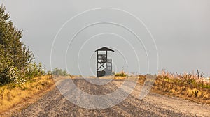 Bird watching tower in the park. Hunting or birdwatching tower