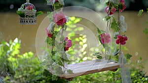 Birdcage with flowers flower swing decorative wedding entourage