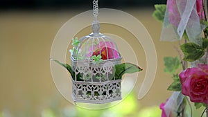 Birdcage with flowers flower swing decorative wedding entourage