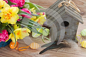 Birdcage with spring flowers