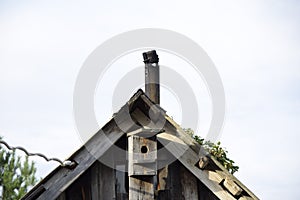 Birdhouse on the roof of an old house. Ulyanovsk Russia