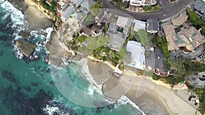Birds Eye Aerial View of Laguna Beach City Coast, California Ocean Waves Breaking on Victoria Beach