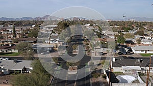 Birds eye drone shot of College Ave in Tempe, Arizona, USA on a bright and sunny day.