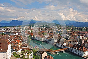 Birds eye view of city Lucerne, Switzerland with Swiss typical buildings looking down on the Spreuer Bridge over River Reuss