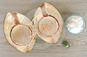 Open Coconut with Meat on a Natural Weathered Wood Background