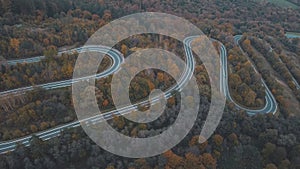 Birds eye view of mountains with Winding road durign autumn