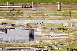 Birds eye view of passenger commuter train on a railway track