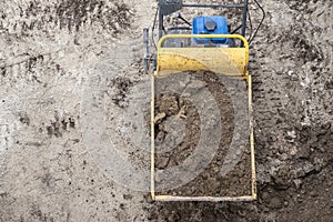 Birds Eye View of a Power Wheelbarrow Filled with Dirt #1