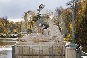 Birds and Sculpture, Autumn in Park, Warsaw, Poland