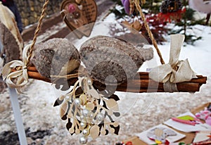 Birds toys and snow in Dolomity mountains, winter image