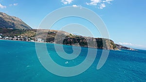 Birdseye view of Himara Beach and Adriatic Sea. Beautiful water Albania Riviera