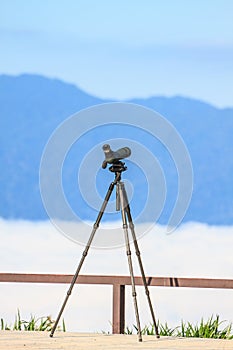 Birdwatching monocular or spotting scope on a tripod