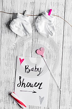 Birth of child - baby shower concept on wooden background
