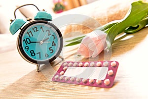 Birth control pills and  clock