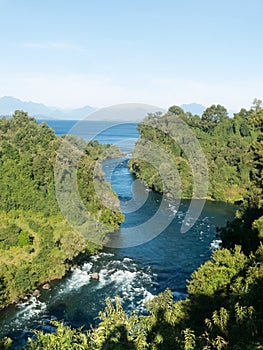 Birth of the Rio Bueno, leaving Lake Ranco. In the region of Los Rios, in Araucania or Patagonia, Chilean Andes. South of Chile photo