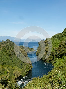 Birth of the Rio Bueno, leaving Lake Ranco. In the region of Los RÃÂ­os, in AraucanÃÂ­a or Patagonia, Chilean Andes. South of Chile photo