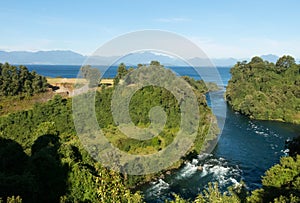 Birth of the Rio Bueno, leaving Lake Ranco. In the region of Los RÃÂ­os, in AraucanÃÂ­a or Patagonia, Chilean Andes. South of Chile photo