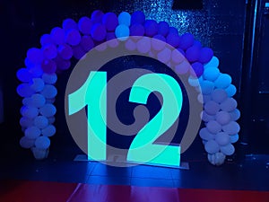 12 birthday balloon arch photo