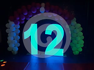 12 birthday balloon arch photo