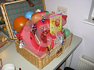A birthday basket filled with presents