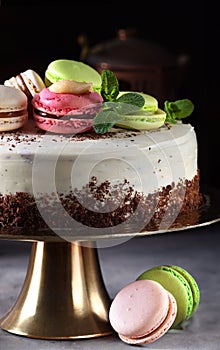 birthday cake with berries and macarons