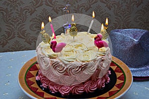 Birthday cake decorated with pineapple. Decorate with candles. And one number is an indication of age