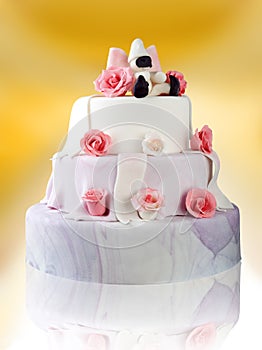 Birthday cake with roses on yellow