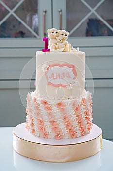 Birthday cake with teddy bears and with the Russian name Liza made of pink cream