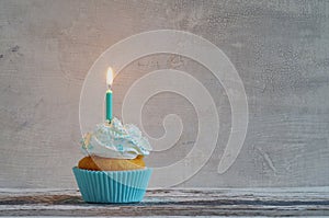 Birthday cake with whipped cream and sugar sprinkles