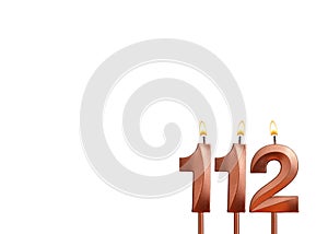 Birthday candle number 112 on white background