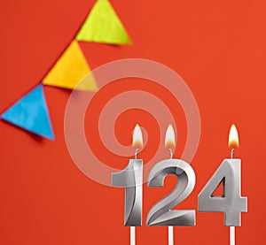 Birthday candle number 124 - Invitation card in orange background