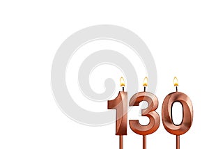 Birthday candle number 130 on white background