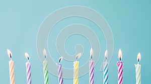 Birthday candles in a row isolated with copy space