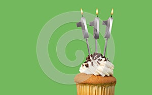 Birthday card with candle number 111 - Cupcake on green background