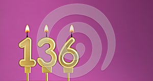 Birthday card with candle number 136 - purple background