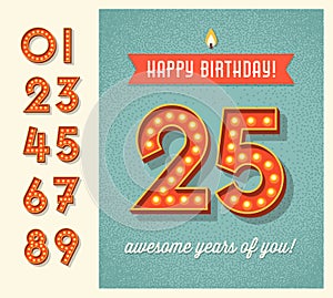 Birthday card with set of lighted retro numbers photo